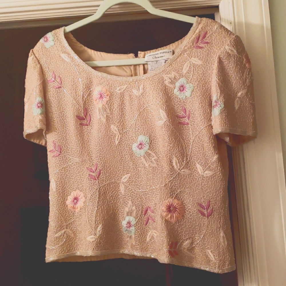 A beaded beige top for formal or casual wear. 12 P